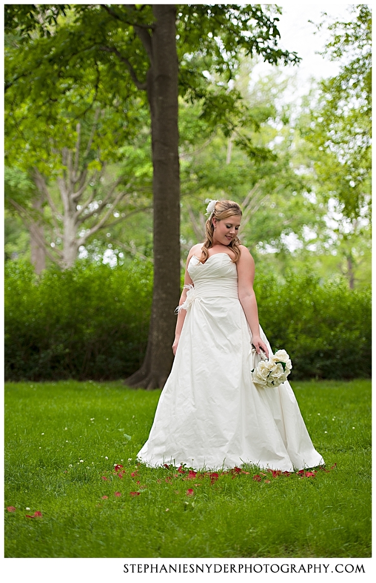 Photo of Bride holding her bouquet of flowers