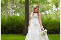 Photo of Bride holding her bouquet of flowers